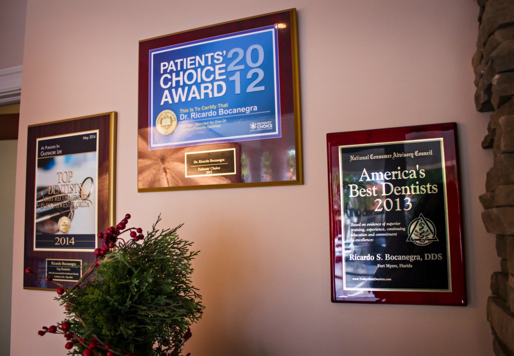 {PRACTICE_NAME} Award Plaques on Display  on office wall